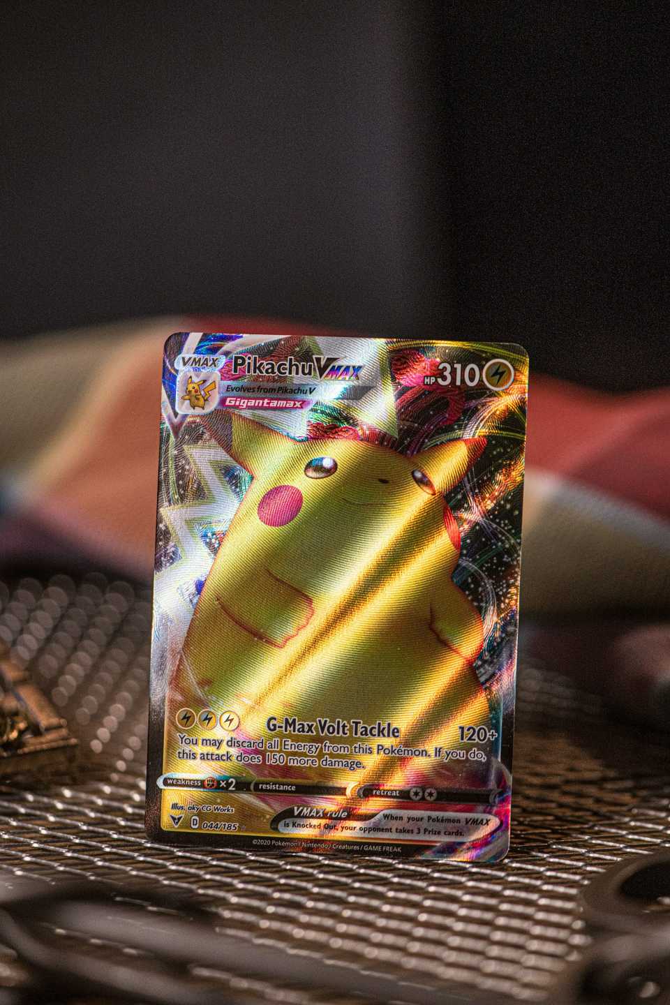 Shiny Pikachu VMAX card with golden glow